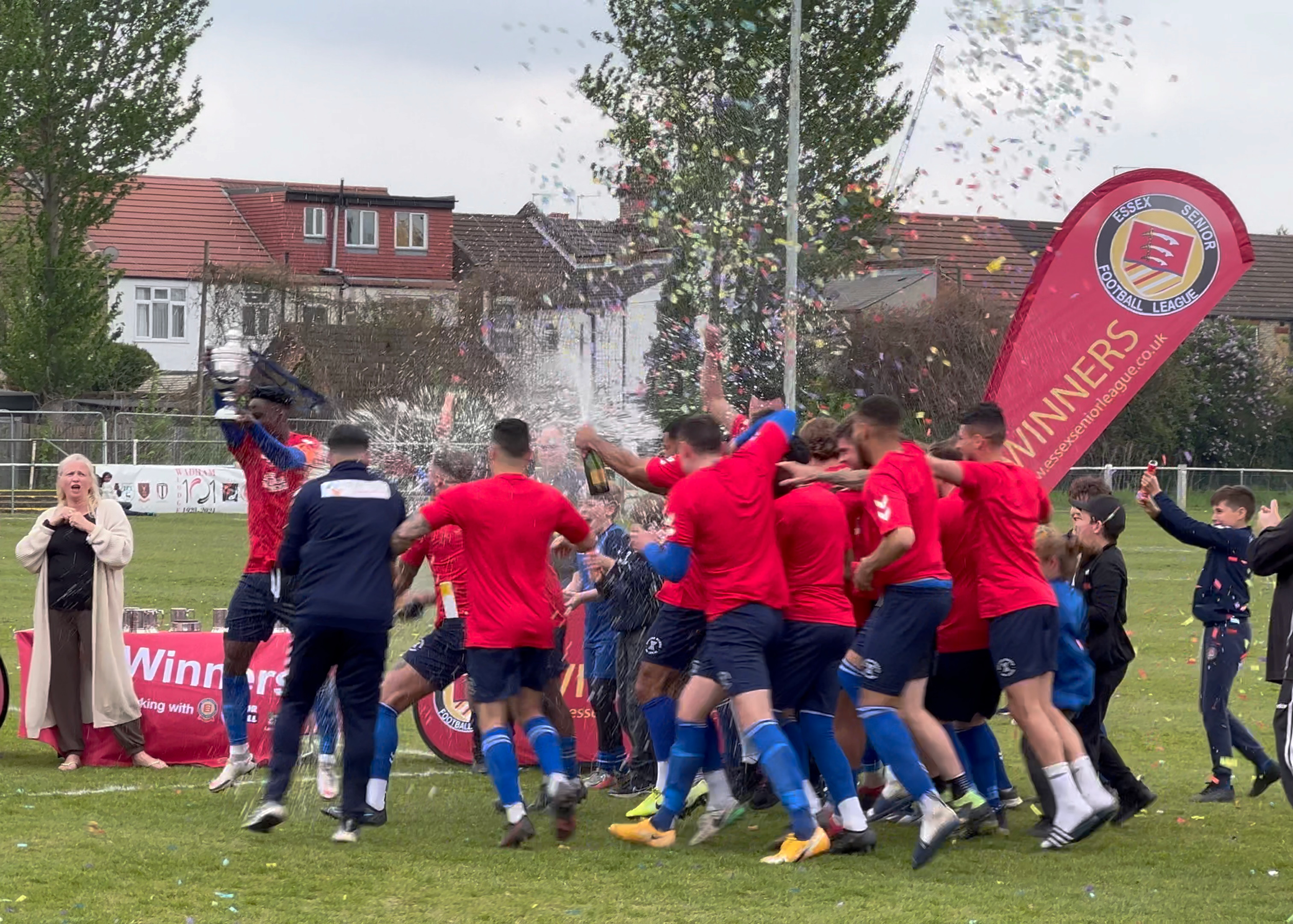 Walthamstow FC celebrating as they collect their trophy